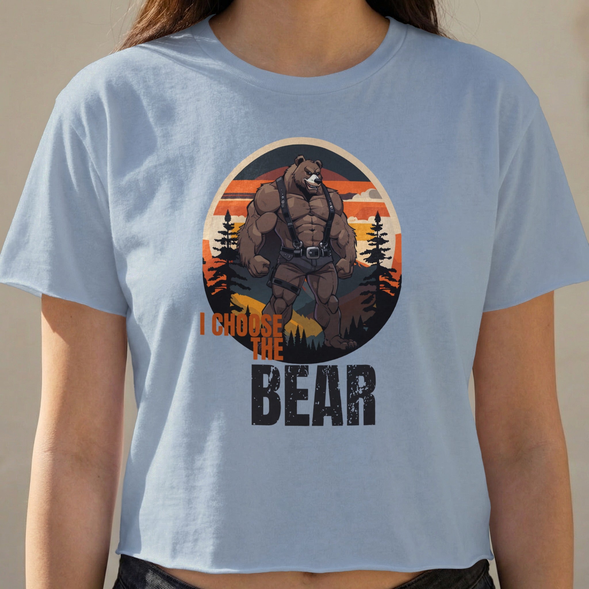 Light blue t-shirt with a muscular bear graphic and "I CHOOSE THE BEAR" text.