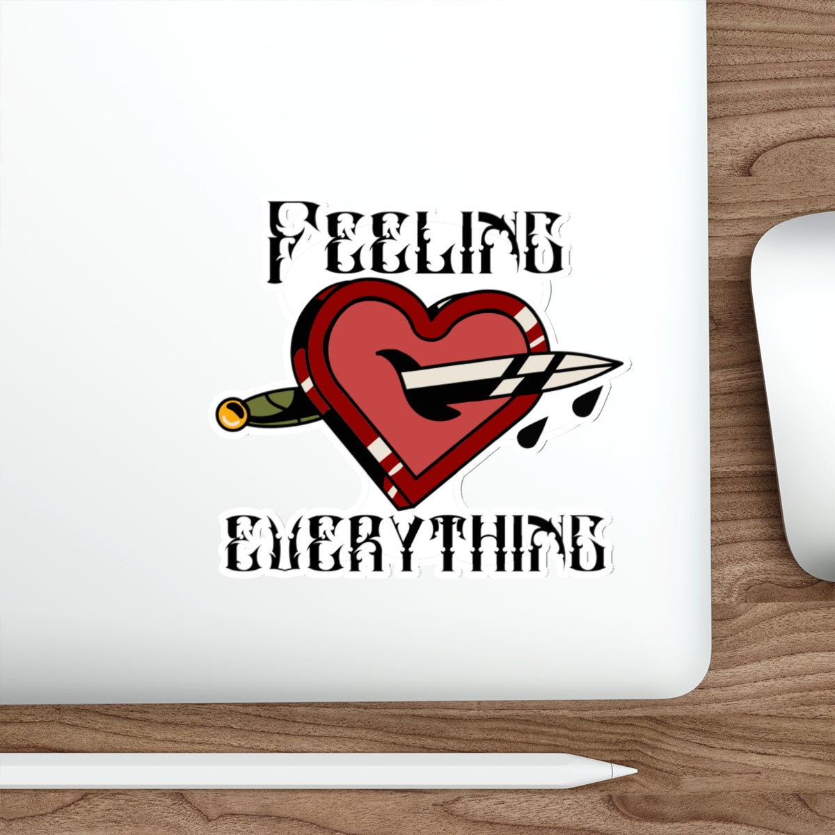 Heart pierced by a dagger, with text "FEELING EVERYTHING".