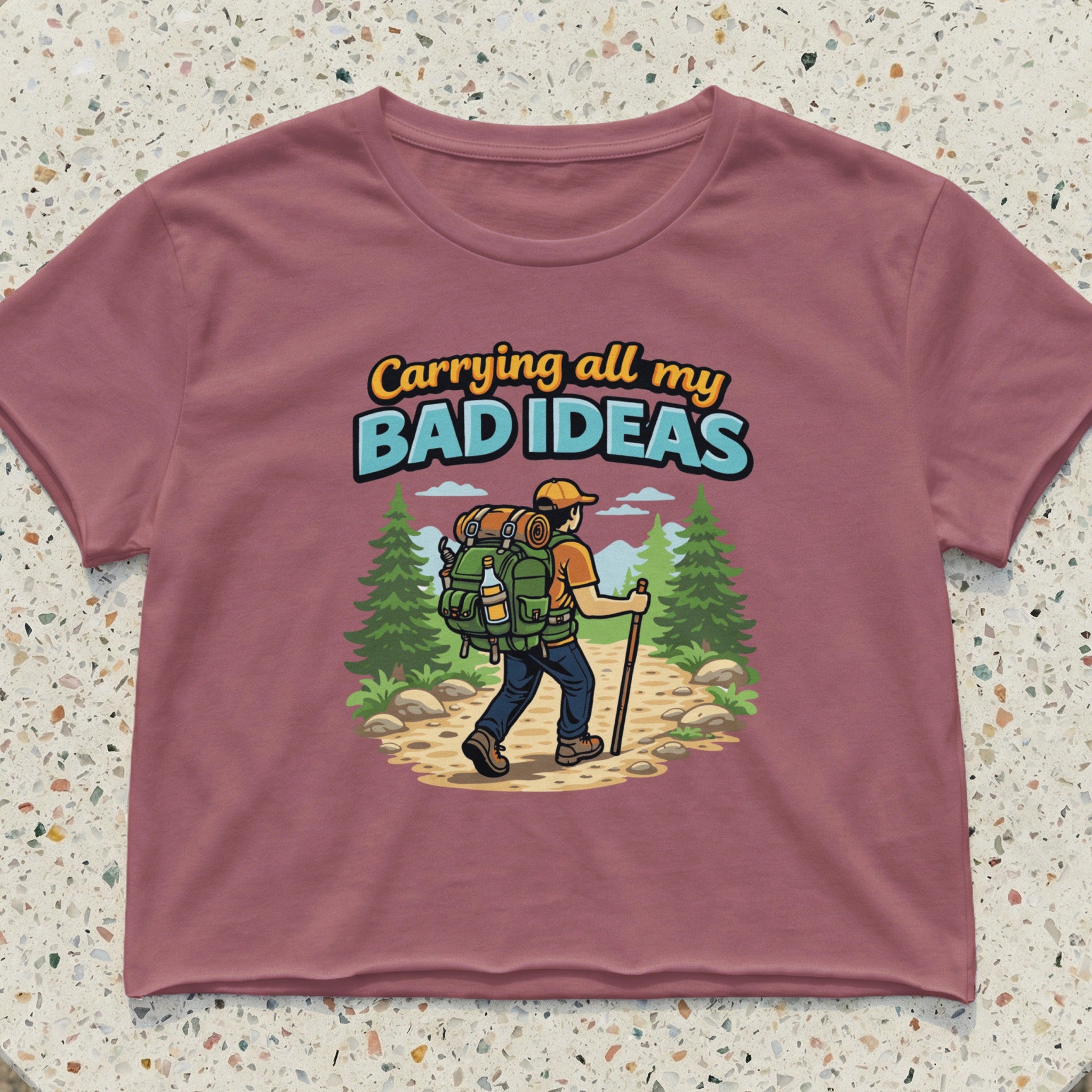 T-shirt with a hiker carrying bad ideas in a backpack.