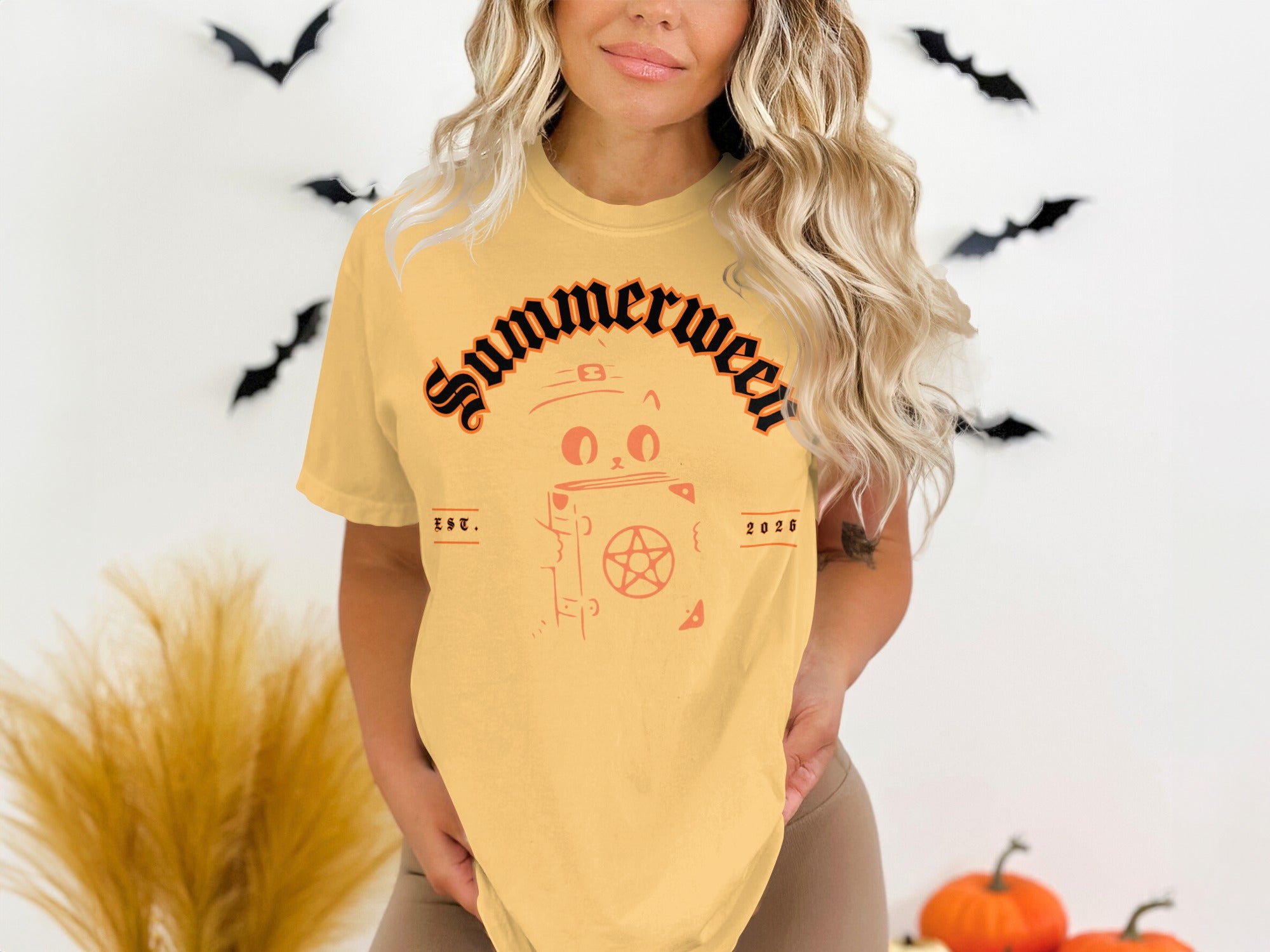 Yellow t-shirt with "Summerween" text, a cat, and a pentagram design.