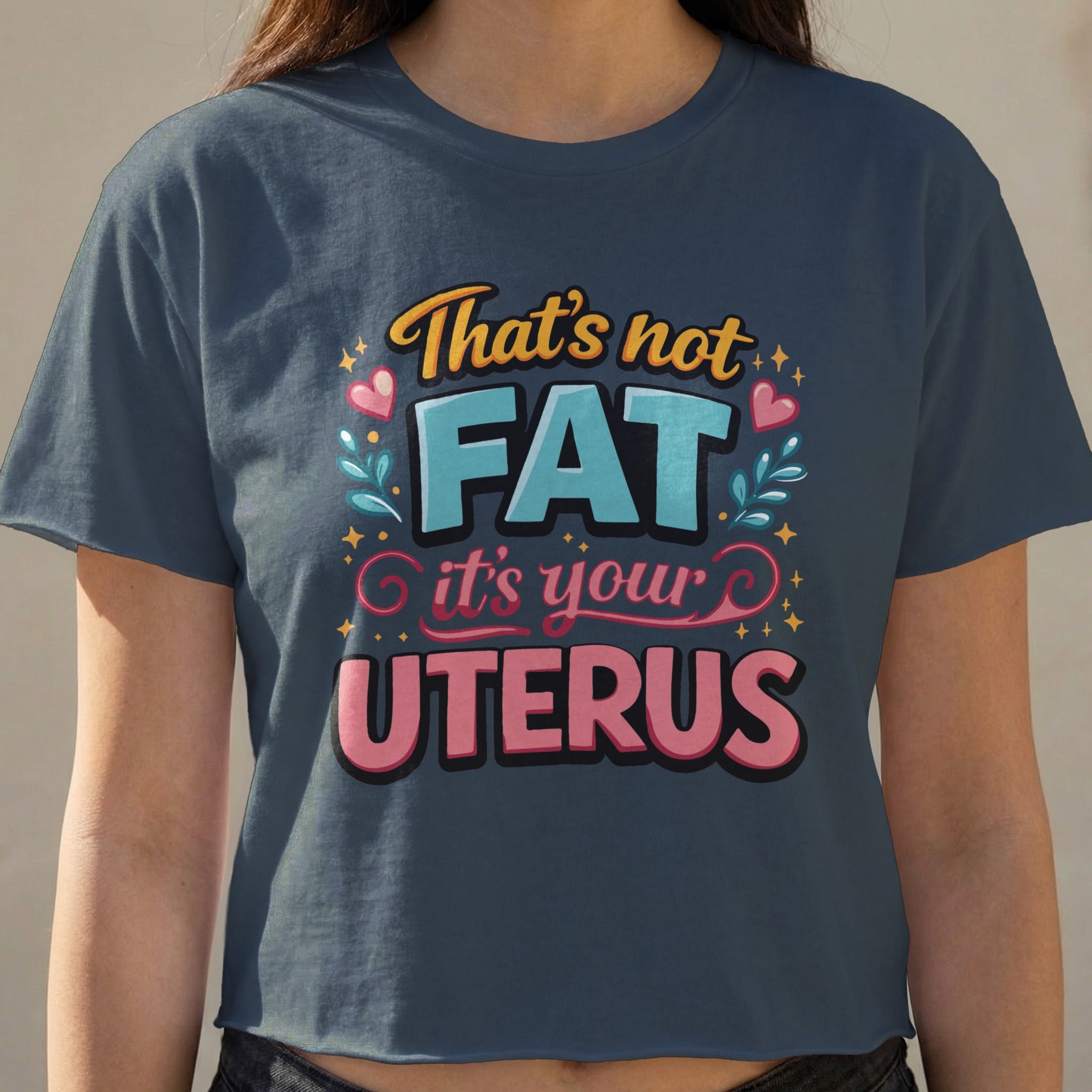 Dark blue t-shirt with "That's not FAT it's your UTERUS" text.