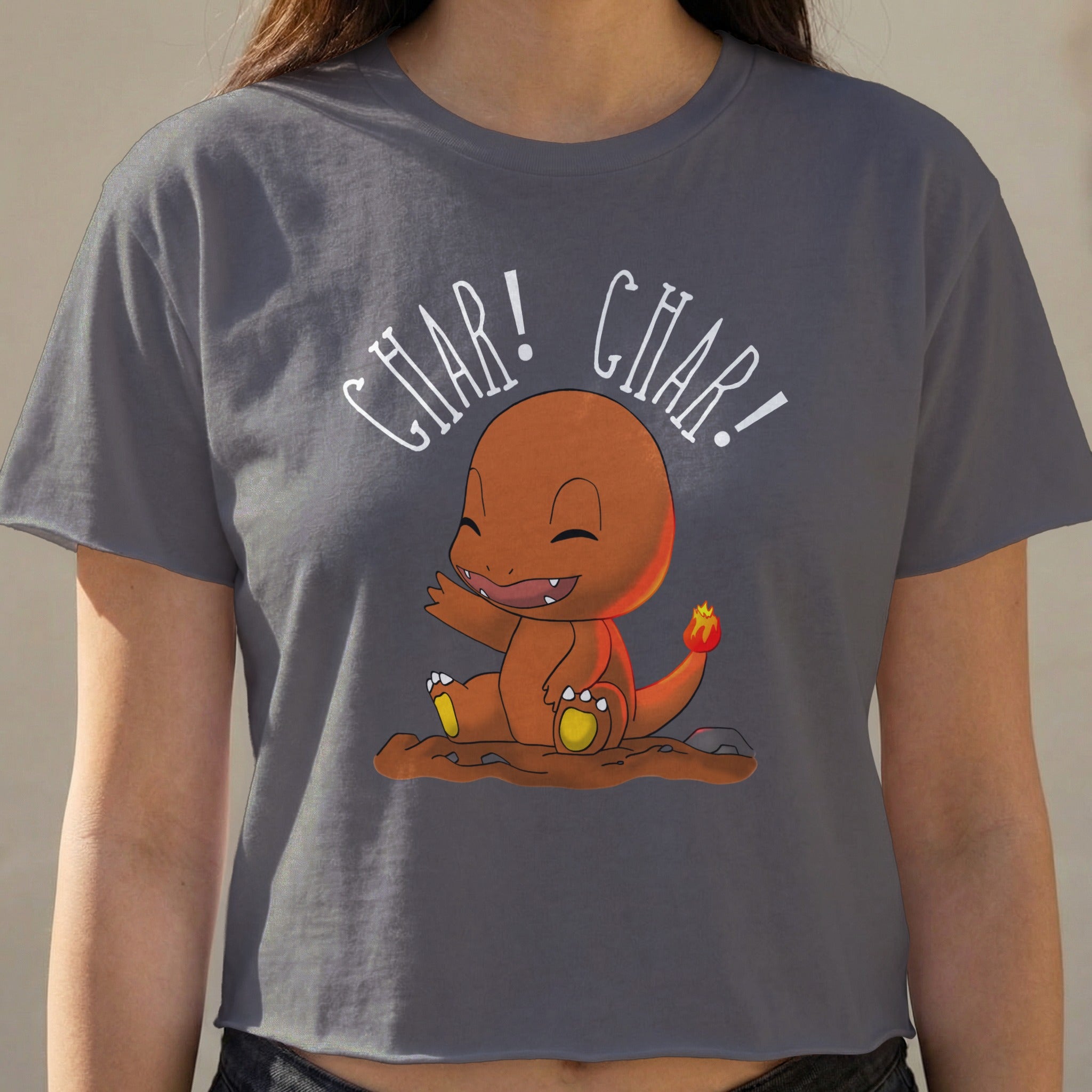 Charmander character in gray t-shirt with "CHAR! CHAR!" text.
