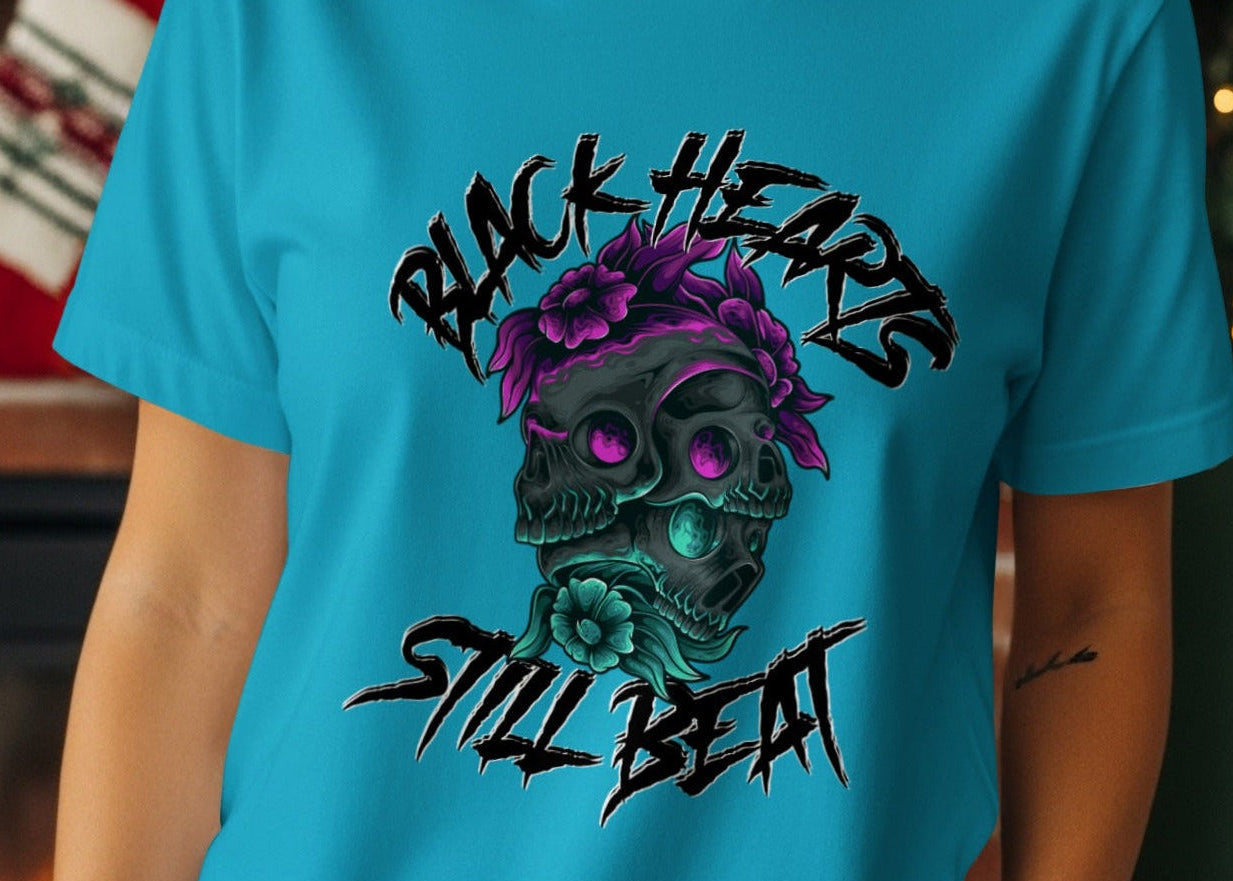 Teal t-shirt with "Black Hearts Still Beat" text and skull graphic.