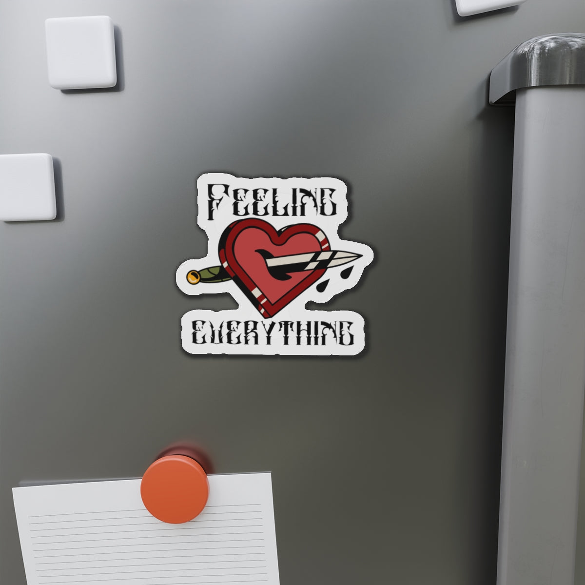Heart pierced by arrow with text "FEELING EVERYTHING".