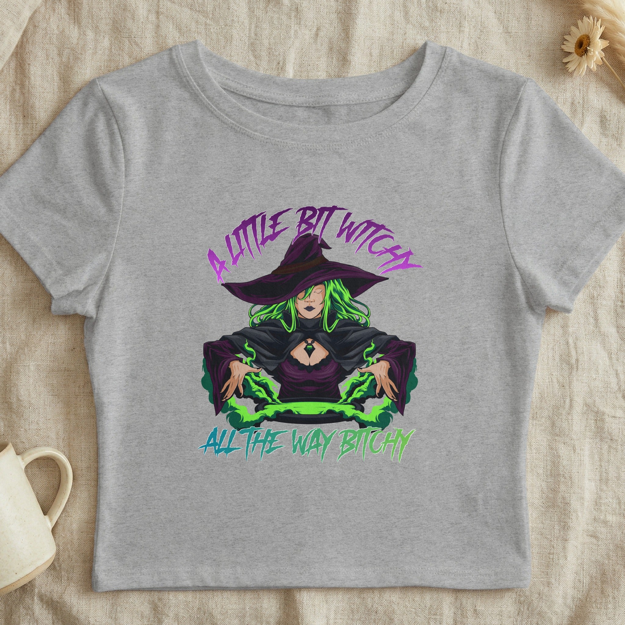 Cropped t-shirt with witch graphic and text "A Little Bit Witchy All The Way Witchy".
