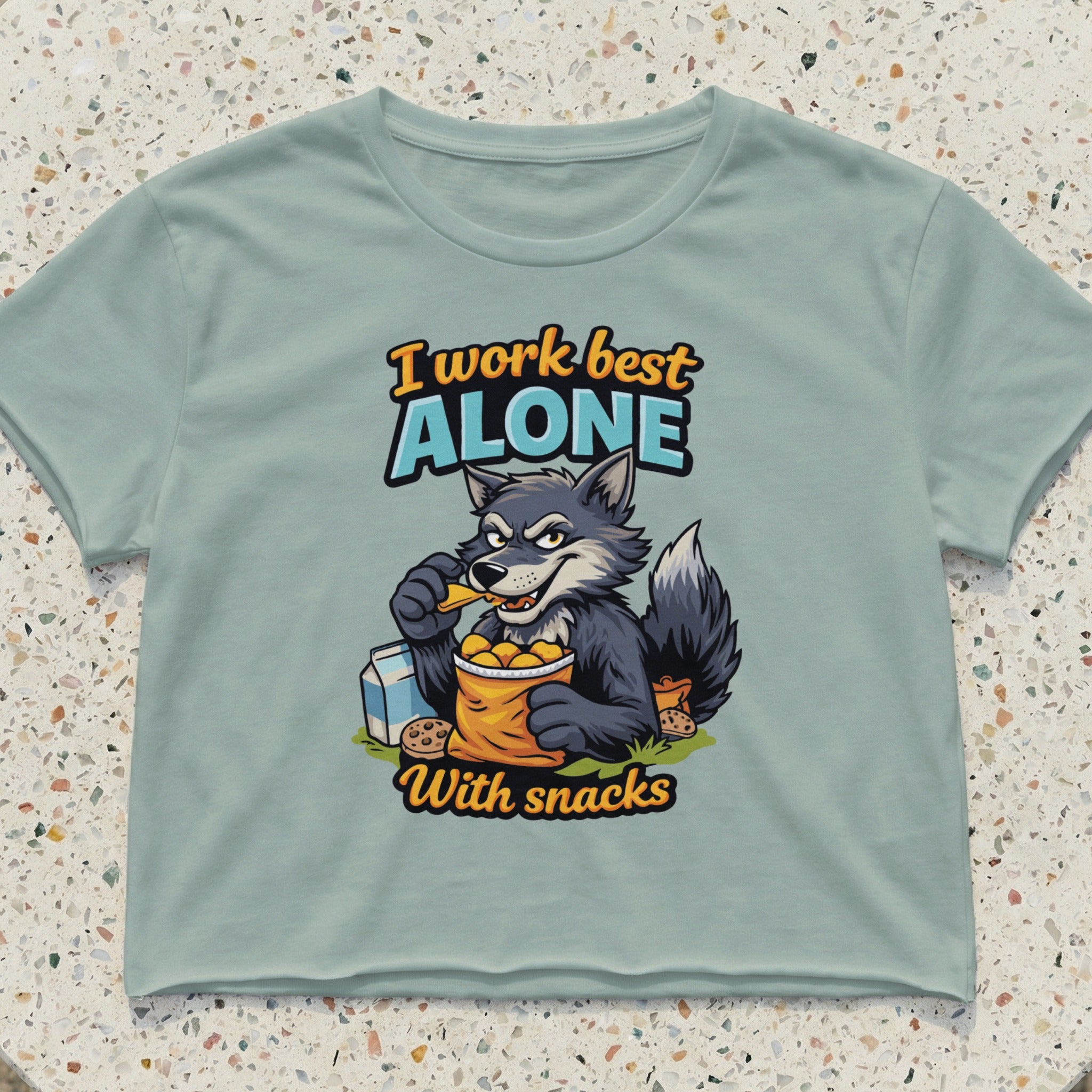 Wolf in a t-shirt with "I work best alone" and "with snacks" text.