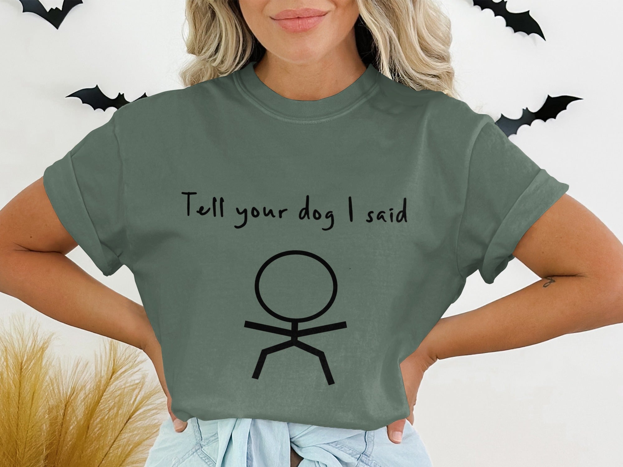 T-shirt with stick figure and text "Tell your dog I said".