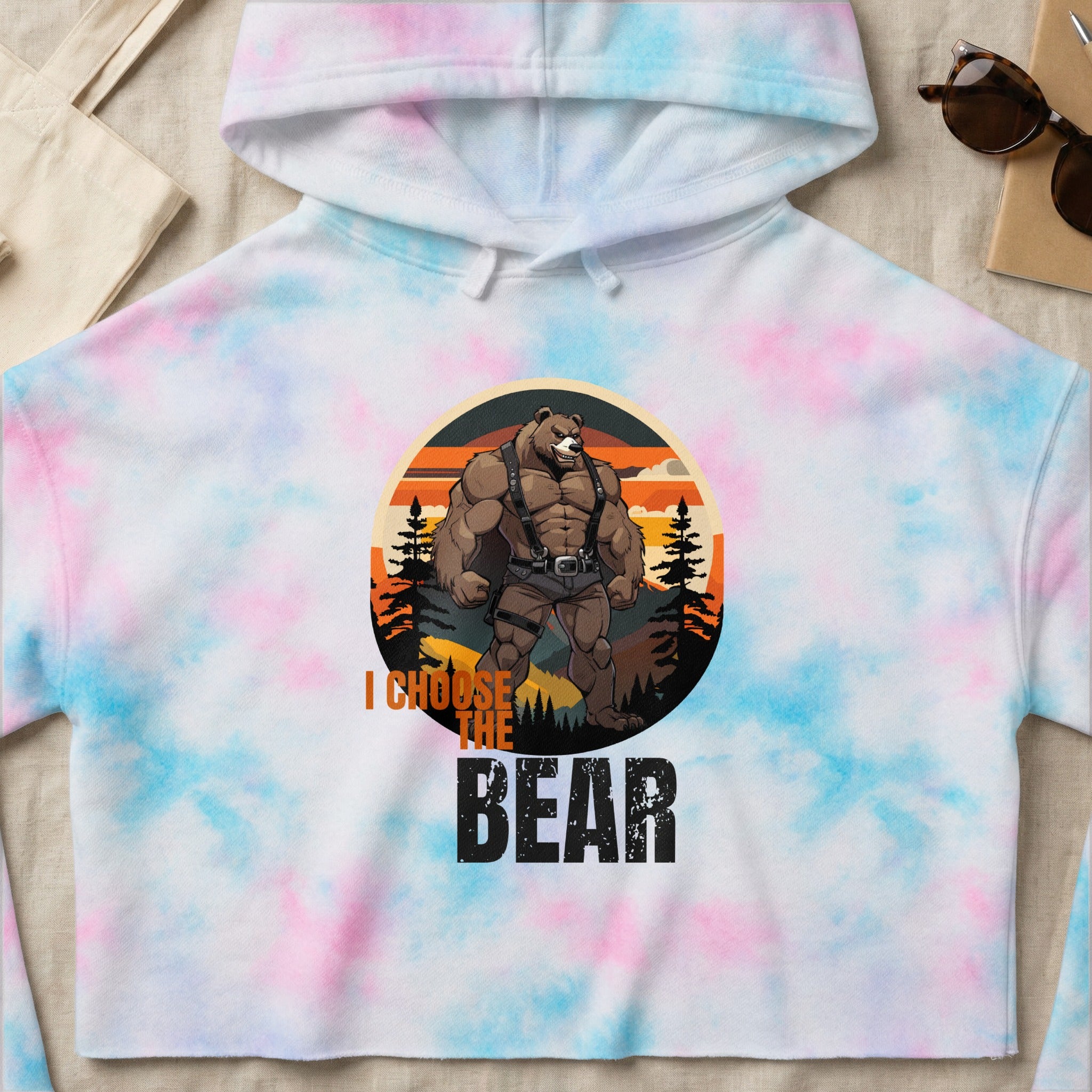 Cropped tie-dye hoodie with muscular bear graphic and text "I CHOOSE THE BEAR."