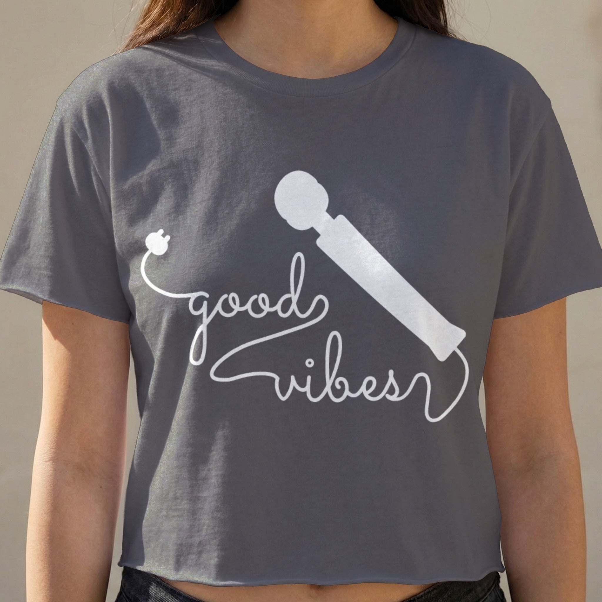 Gray t-shirt with "good vibes" text and a silhouette of a personal massager.