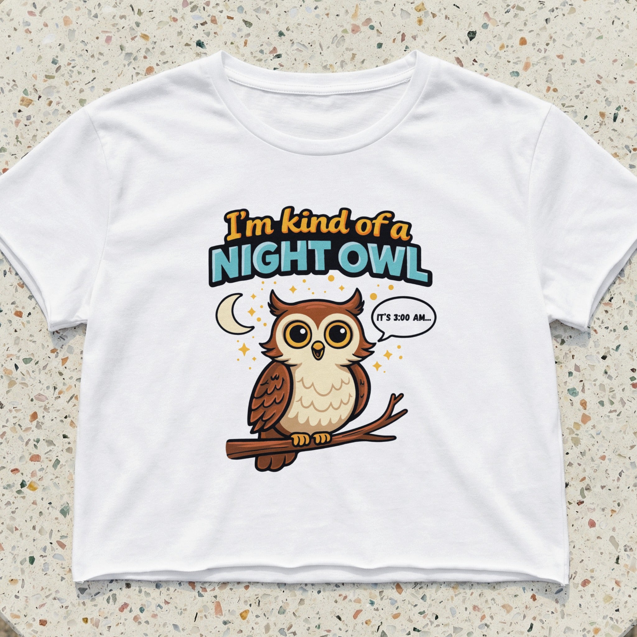 White crop top with a cartoon owl illustration and the text "I'm kind of a night owl... IT'S 3:00 AM...".