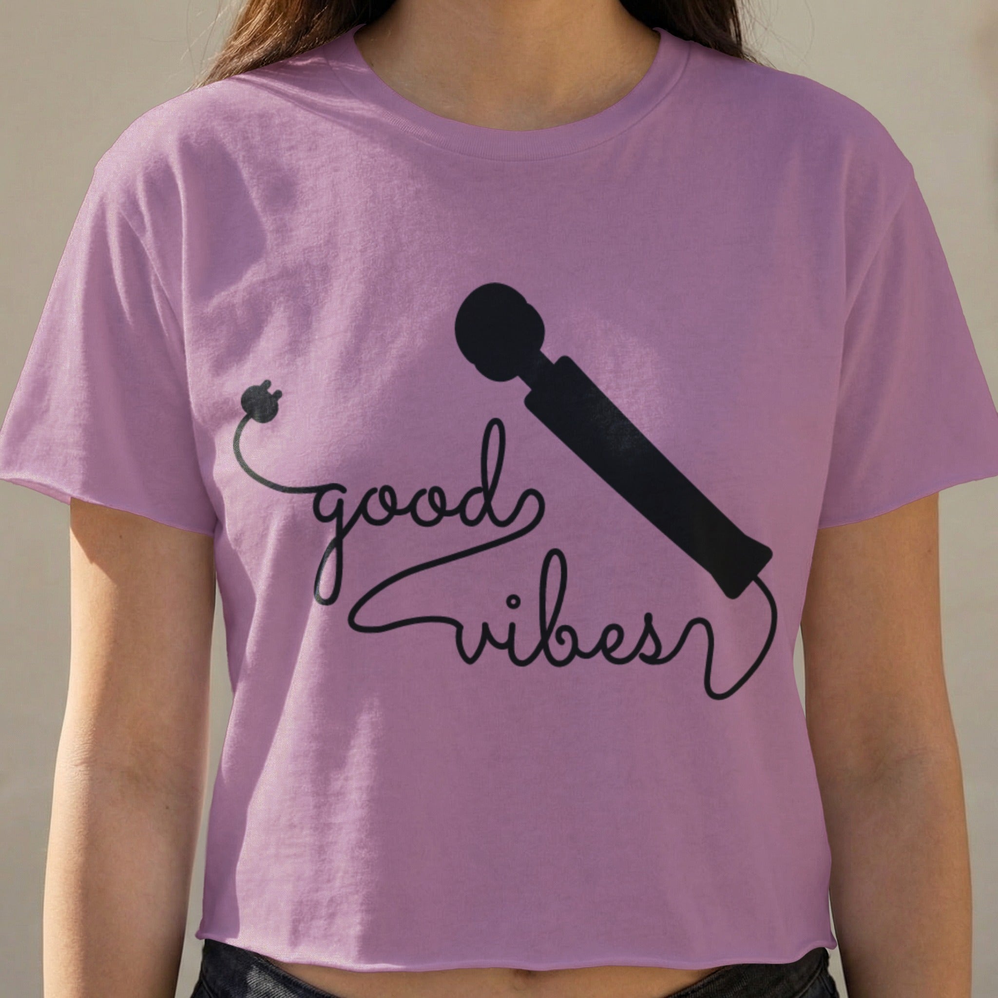 Purple cropped t-shirt with "good vibes" text and a vibrator illustration.