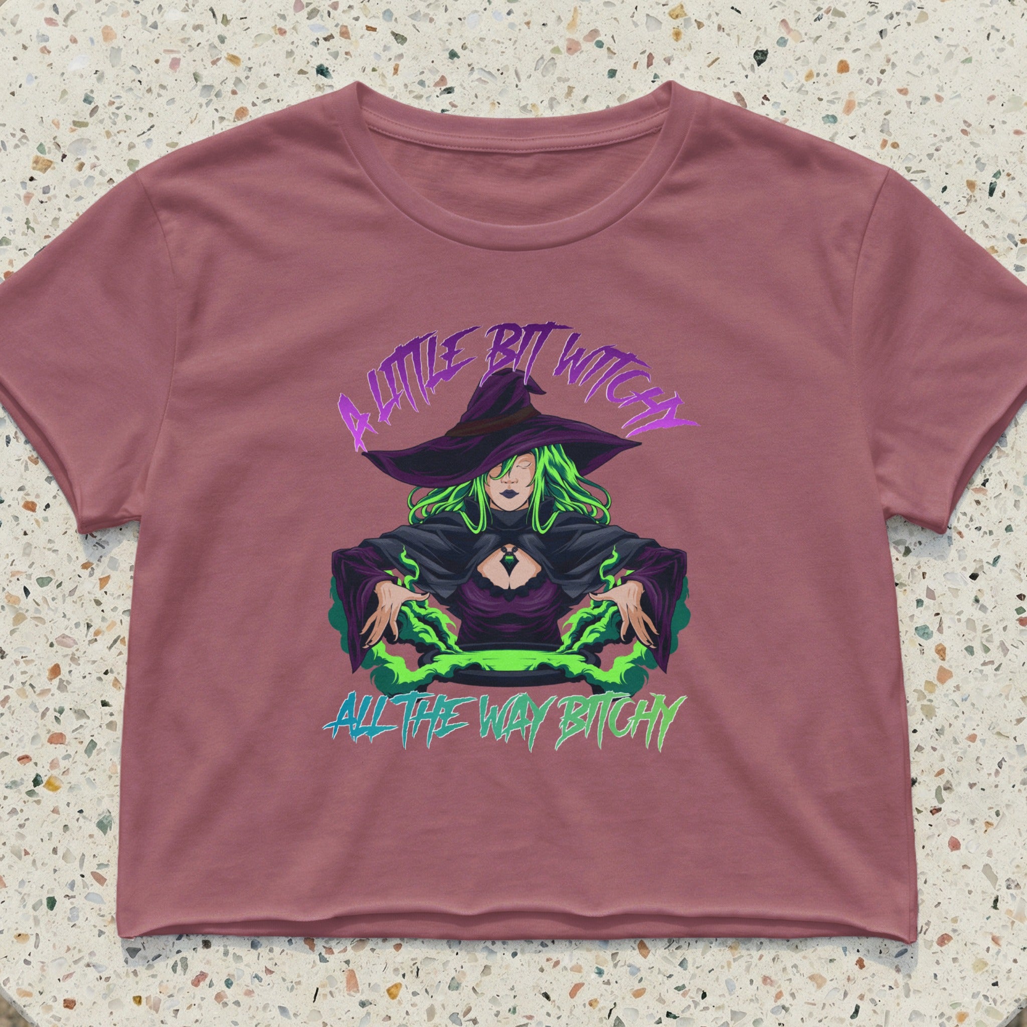 Cropped t-shirt with a witch illustration and text "A Little Bit Witchy All The Way Bitchy."