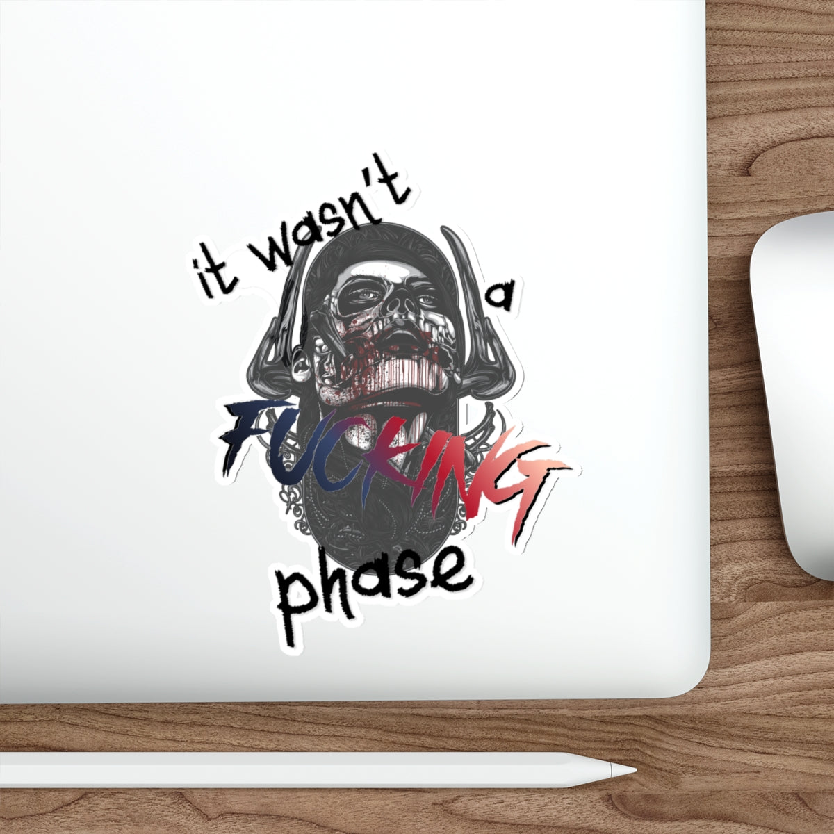 Skull sticker with headphones and text "it wasn't a fucking phase".