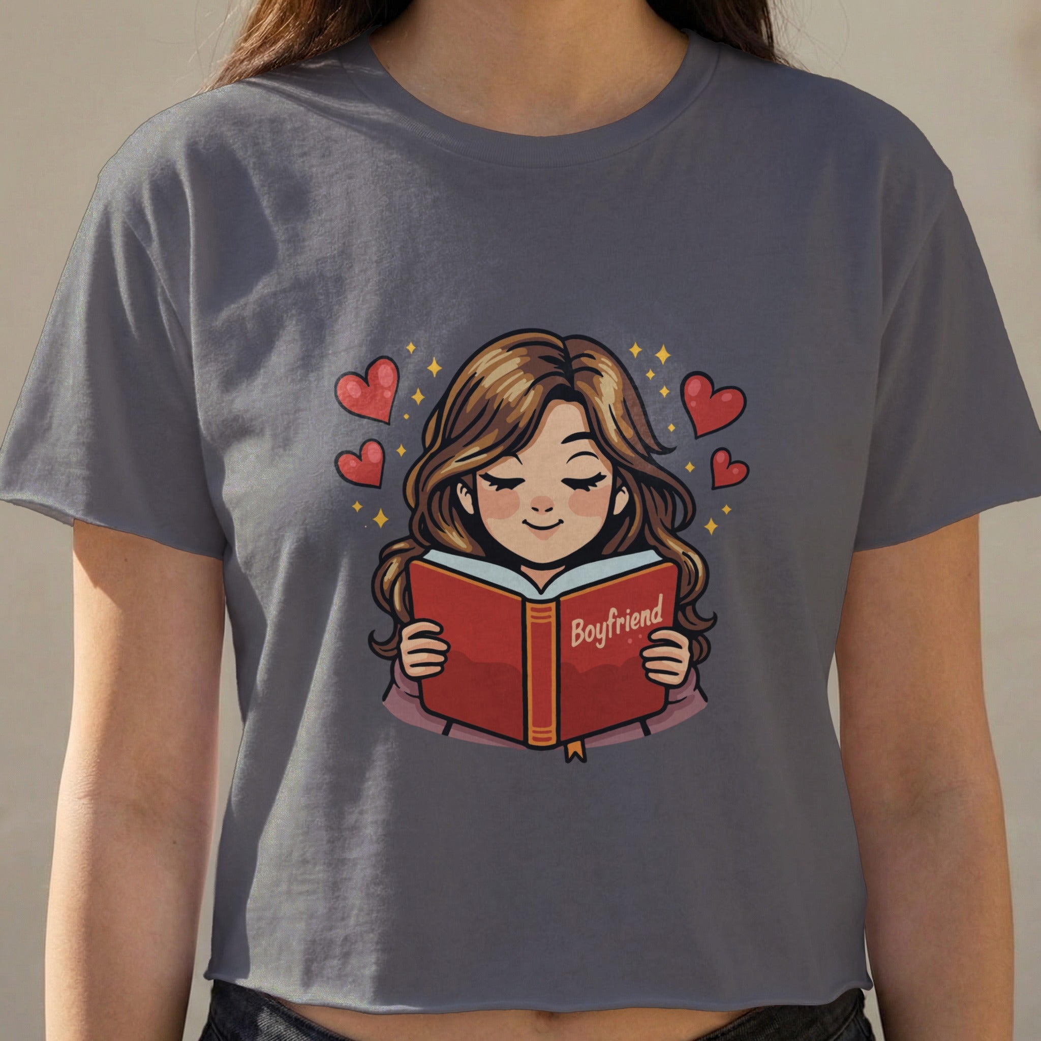 Cartoon girl reading a book titled "Boyfriend" with hearts.