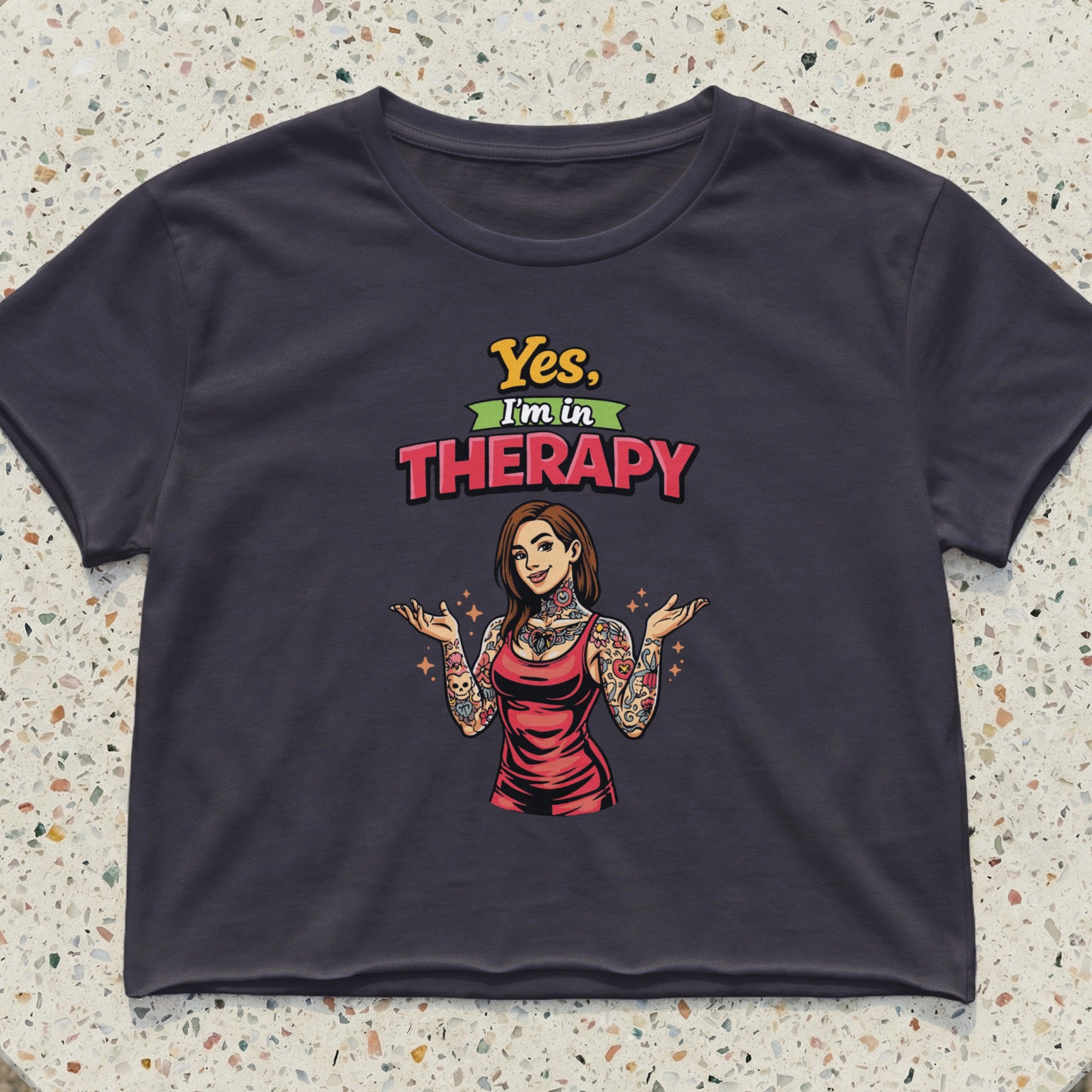 Woman with tattoos wearing red dress, text "Yes, I'm THERAPY".