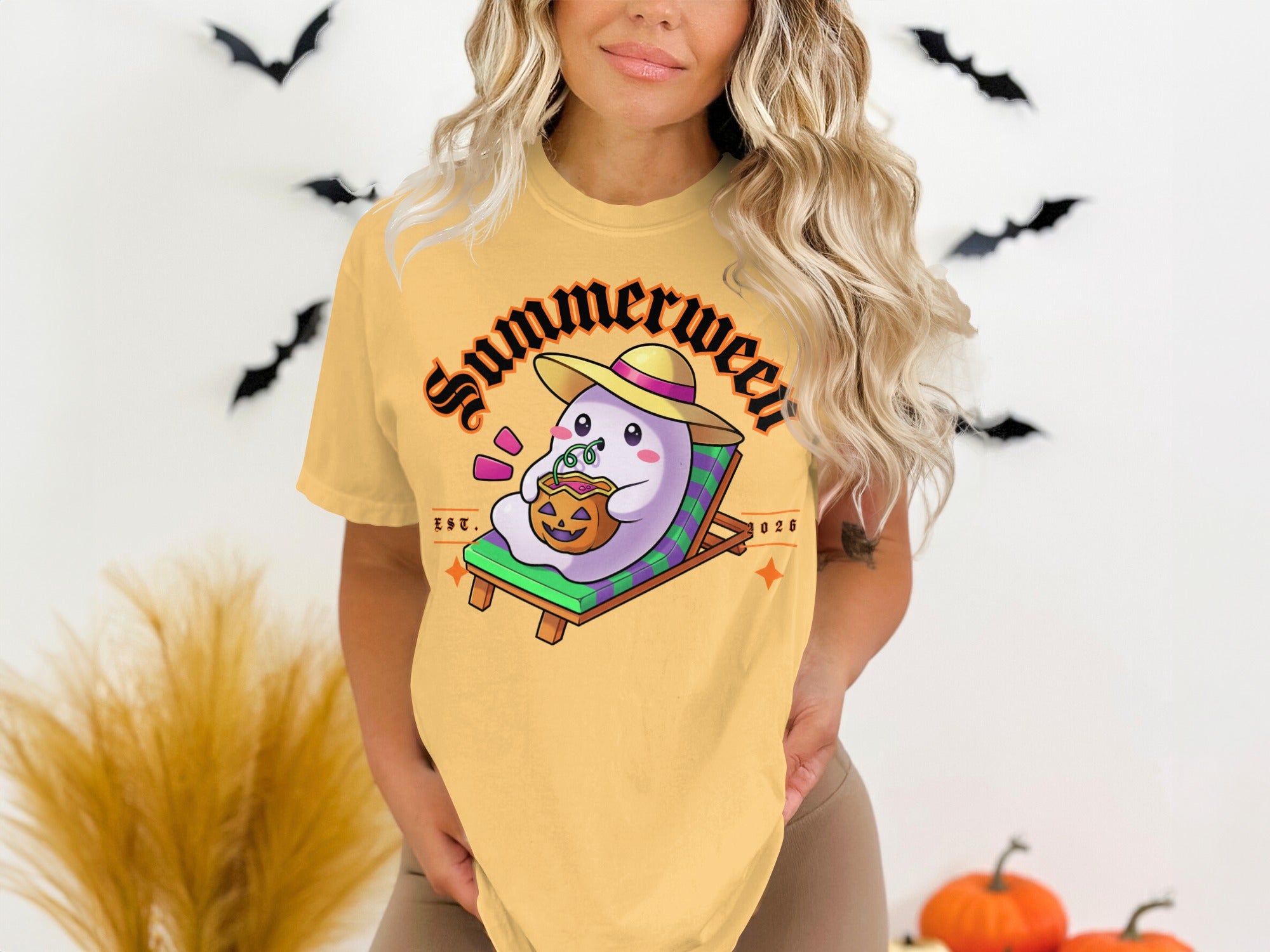 Ghost in sunhat holding pumpkin drink on lounge chair with "Summerween" text.
