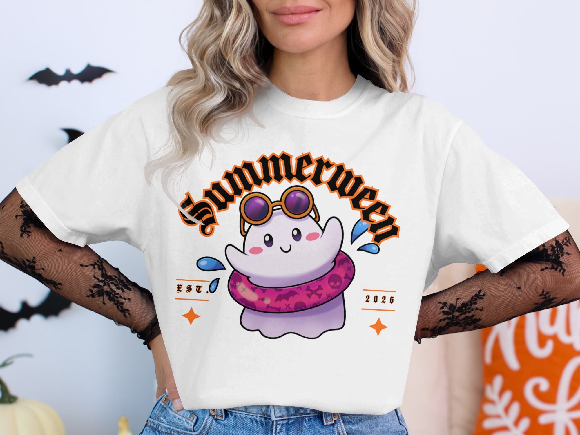White t-shirt with "Summerween" graphic featuring a ghost with sunglasses and a pool float.