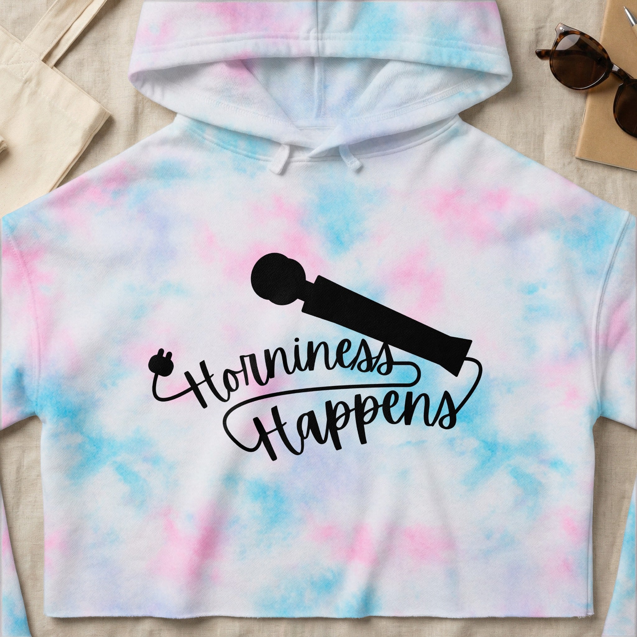 Tie-dye cropped hoodie with "Horniness Happens" text and a vibrator graphic.